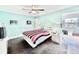 Cozy bedroom with carpet, ceiling fan, and natural light at 5227 81St Lane N # 26, St Petersburg, FL 33709