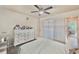 Bedroom with closet, ceiling fan, and tiled floor at 5227 81St Lane N # 26, St Petersburg, FL 33709