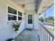 Cozy condominium entrance with an outdoor view and simple decor, offering a private and welcoming entry at 5227 81St Lane N # 26, St Petersburg, FL 33709