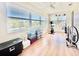 Bright room with hardwood floors and a view of the outdoors at 5227 81St Lane N # 26, St Petersburg, FL 33709
