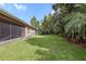 Well-maintained lawn and landscaping perfect for outdoor activities and relaxation at 5310 Sanderling Ridge Dr, Lithia, FL 33547
