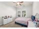 Bright bedroom with a bed, desk and dresser at 5310 Sanderling Ridge Dr, Lithia, FL 33547