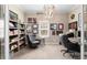 Cozy home office with built in shelving, desk and decor at 5310 Sanderling Ridge Dr, Lithia, FL 33547
