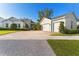 Charming single-Gathering home with manicured landscaping and a three car garage at 5903 Nature Ridge Ln, Lithia, FL 33547
