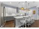 Beautiful kitchen with white cabinets, stainless steel appliances, and a center island with seating at 5903 Nature Ridge Ln, Lithia, FL 33547