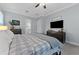 Comfortable main bedroom with a large bed, matching dressers, and neutral walls at 5903 Nature Ridge Ln, Lithia, FL 33547
