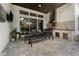 This screened-in patio includes a modern outdoor kitchen and grill, perfect for entertaining at 5903 Nature Ridge Ln, Lithia, FL 33547