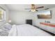 Bedroom boasts modern fixtures, wood-look flooring, and ample natural light at 6416 Lomand Ave, New Port Richey, FL 34653