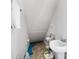 Unfinished basement bathroom with pedestal sink, utilitarian storage, and simple finishes, ready for customization at 706 S Davis Blvd, Tampa, FL 33606