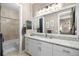 Bright bathroom featuring granite countertops, recessed lights and neutral color palette at 706 S Davis Blvd, Tampa, FL 33606