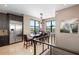 Bright dining room with large windows offering a cityscape view, stainless refrigerator, and modern lighting at 706 S Davis Blvd, Tampa, FL 33606