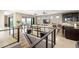 Open-concept living area with tile flooring, modern furnishings, and golf course views at 706 S Davis Blvd, Tampa, FL 33606