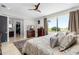 Bright main bedroom featuring a view of the outdoors, ensuite bathroom and walk-in closet at 706 S Davis Blvd, Tampa, FL 33606