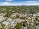 Stunning aerial view of the neighborhood showcasing the lush greenery and distant cityscape at 718 30Th N Ave, St Petersburg, FL 33704