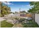 Fenced backyard with a combination of wood and picket fencing, offering privacy and a rustic charm at 718 30Th N Ave, St Petersburg, FL 33704