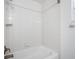 Clean bathroom featuring a shower-tub combination with white tiling at 718 30Th N Ave, St Petersburg, FL 33704