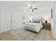 Bright bedroom features a ceiling fan, plush rug and natural light at 718 30Th N Ave, St Petersburg, FL 33704