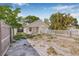 Exterior view of a cozy home with a fenced front yard and landscaping at 718 30Th N Ave, St Petersburg, FL 33704