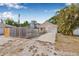 Exterior view of a home with a driveway and a fenced yard at 718 30Th N Ave, St Petersburg, FL 33704