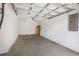An empty garage with an electrical panel at 718 30Th N Ave, St Petersburg, FL 33704