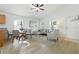 Open concept living area with light floors, neutral decor, and lots of natural light at 718 30Th N Ave, St Petersburg, FL 33704