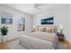 Comfortable main bedroom with wood floors, natural light, and contemporary decor at 718 30Th N Ave, St Petersburg, FL 33704