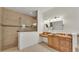 Bright bathroom with tile floors, granite counters, and a glass enclosed shower at 729 Manns Harbor Drive, Apollo Beach, FL 33572