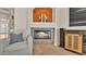Living room fireplace with decorative mantel and comfortable seating at 729 Manns Harbor Drive, Apollo Beach, FL 33572