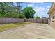 Large fenced backyard with a concrete patio perfect for entertaining at 8184 Rose Ter, Seminole, FL 33777