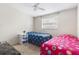 Shared bedroom with twin beds, ceiling fan, carpet flooring and natural light at 8184 Rose Ter, Seminole, FL 33777