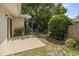 Private backyard with landscaping at 834 Cambridge Ct, Dunedin, FL 34698