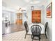 Charming dining area with seating for four and stylish decor at 8413 Moulton Dr, Port Richey, FL 34668