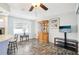The dining room includes a hutch and a table set, providing ample space for entertaining at 8413 Moulton Dr, Port Richey, FL 34668