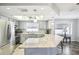 Well-equipped kitchen featuring stainless steel appliances and granite countertops at 8413 Moulton Dr, Port Richey, FL 34668