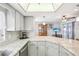 Updated kitchen featuring granite countertops and stainless steel appliances at 8413 Moulton Dr, Port Richey, FL 34668