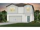 Charming two-story home featuring a two-car garage, neutral color palette, and lush landscaping at 9768 Crescent Moon Dr, Riverview, FL 33578