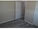 Bedroom with new flooring and a closet with a white door at 9825 41St N St, Pinellas Park, FL 33782