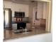 Updated kitchen featuring stainless steel appliances, granite countertops, and white shaker cabinets at 9825 41St N St, Pinellas Park, FL 33782