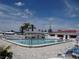 Enjoy the community pool area with nearby covered seating and restrooms at 9825 41St N St, Pinellas Park, FL 33782
