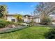 Well-kept home with green lawn, landscape beds and stone pathway to door at 1004 Hollyberry Ct, Brandon, FL 33511