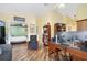 Comfortable office space with a high ceiling, convenient built-in bookshelves, and an adjacent bedroom at 1004 Hollyberry Ct, Brandon, FL 33511