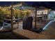 Outdoor kitchen featuring a dining table, grill, and patio, perfect for gatherings and relaxing evenings at 1004 Hollyberry Ct, Brandon, FL 33511