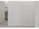 A partially opened bathroom shows a gray vanity and a granite countertop at 10749 Tally Fawn Loop, San Antonio, FL 33576