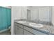 Bathroom with granite countertops and a double vanity at 10749 Tally Fawn Loop, San Antonio, FL 33576