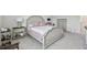 Bedroom with neutral tones, carpeted flooring, and comfortable furnishings at 10749 Tally Fawn Loop, San Antonio, FL 33576