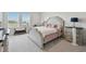 Bedroom with ample natural light and neutral color palette at 10749 Tally Fawn Loop, San Antonio, FL 33576