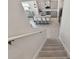 Open concept kitchen with an island, granite countertops, stainless appliances and breakfast bar area at 10749 Tally Fawn Loop, San Antonio, FL 33576