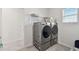 Laundry room equipped with modern washer and dryer at 10749 Tally Fawn Loop, San Antonio, FL 33576
