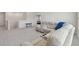 Comfortable sectional couch in a spacious and bright living area at 10749 Tally Fawn Loop, San Antonio, FL 33576