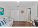 A versatile room with a large closet and an open floorplan, adaptable as a bedroom or office at 1077 Captains Way, Tarpon Springs, FL 34689